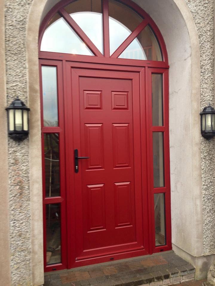 Red front door with an arched fanlight, fitted by CT Improvements